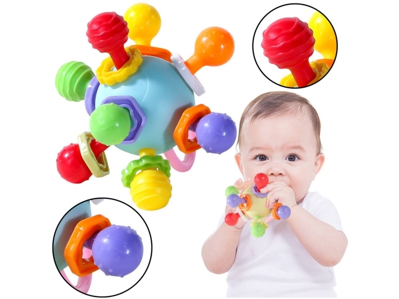 Sensorisk bidering med rangle til babyer Farverig