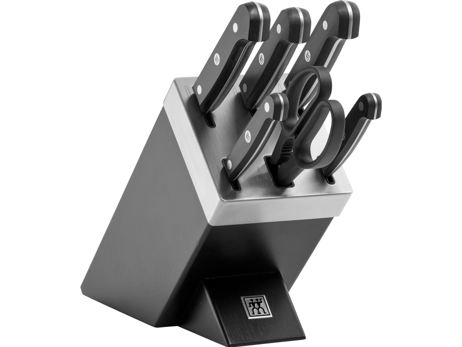 ZWILLING Gourmet Knivset med självslipande block 7 delar. Innehåller: Skalkniv 10cm - grönsakskniv tandad 13 cm - kött/filé kniv 16cm - kockkniv 20cm - brödkniv 20cm - Universalsax 20,5 cm - knivblock, självslipande i svart ask & matt borstad rostfri överdel. | Köksutrustning - Knivar och brynstål - Knivblock | GameStuff