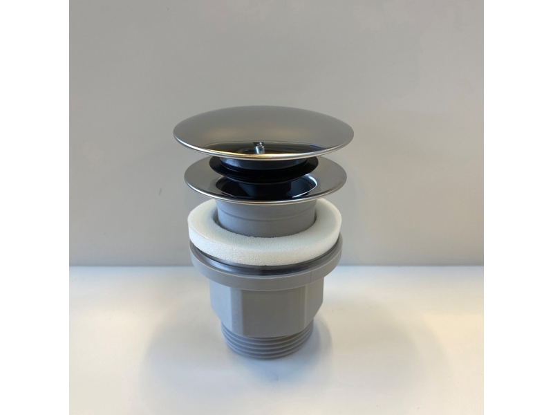 Ideal Standard 1 1/4 forkromet push open bundventil i plast med topcover i rustfrit stål