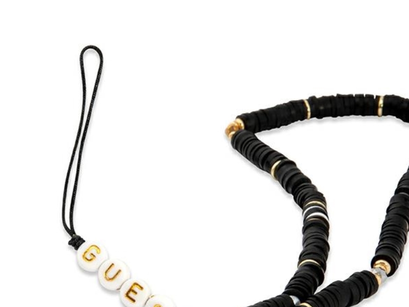 GUESS Guess zawieszka GUSTPEARK Phone Strap czarny/black Heishi Beads