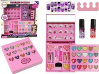 A set of beauty products. A large palette of shadows, lipsticks, nail polishes